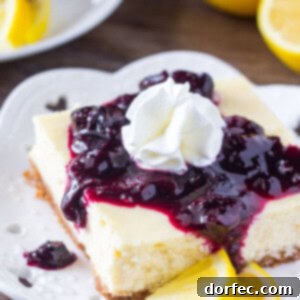 Zesty Lemon Blueberry Cheesecake Bars 2 These lemon blueberry cheesecake bars are smooth & creamy with a delicious lemon flavor and crunchy graham cracker crust. Then the blueberry sauce makes them extra special!