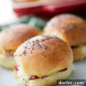 These Irish Sliders made with corned beef, melted Dubliner Irish cheese, sauerkraut and spicy Irish mustard on potato slider rolls are a must have for your next gathering.
