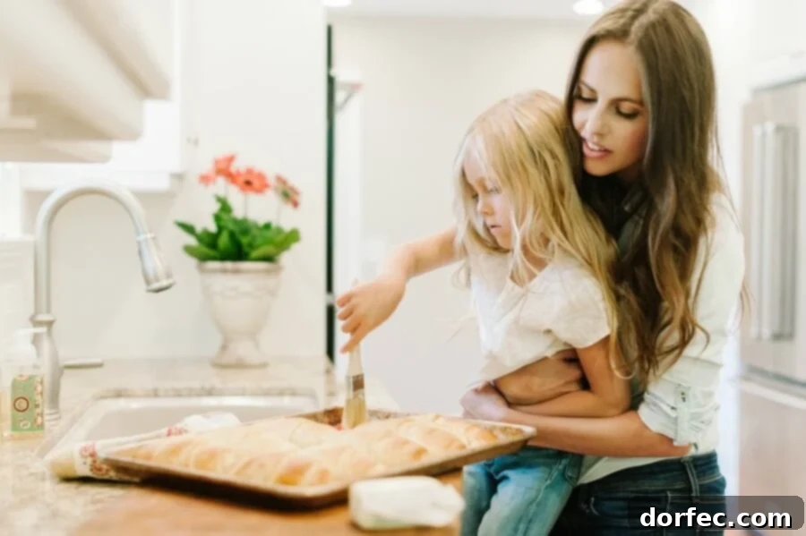 12 Precious Moments to Create With Your Daughter Before She's Grown 6 Two children enthusiastically helping in the kitchen, learning to cook with an adult.