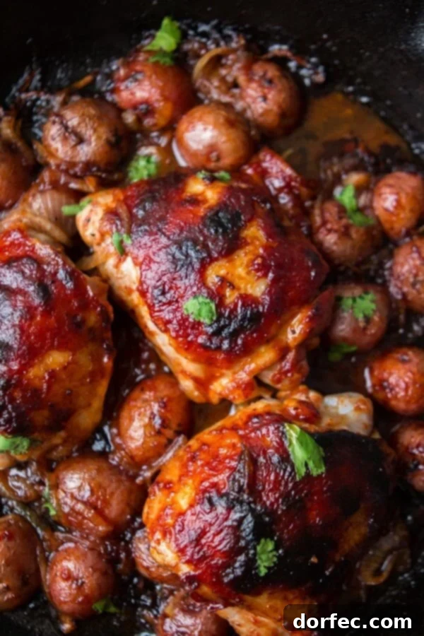 Delicious one-skillet BBQ chicken and potatoes for an easy make-ahead dinner. Features roasted potatoes and tender caramelized onions with juicy chicken.