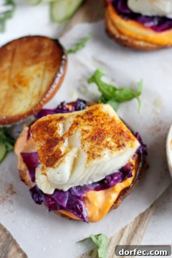 Fast Dinner Idea: Blackened Fish Burger Overhead shot of the blackened fish burger with sriracha mayo, showcasing the toasted bun and fresh ingredients.