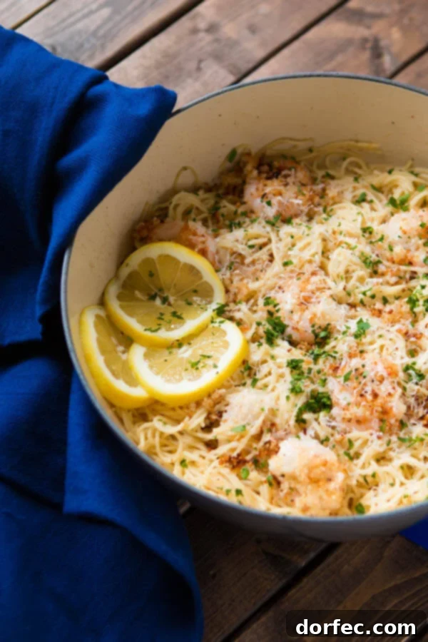 One Pot Crispy Parmesan Shrimp Scampi Pasta 4 Overhead shot of butter, lemon, and fresh parsley, essential ingredients for the vibrant shrimp scampi sauce.