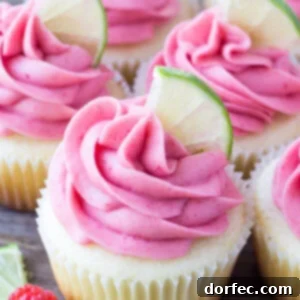 These Raspberry Lime Cupcakes are so pretty and have such a fun flavor combo. They start with moist vanilla cupcakes with a fresh hint of lime, then they're frosted with raspberry buttercream made from fresh berries.