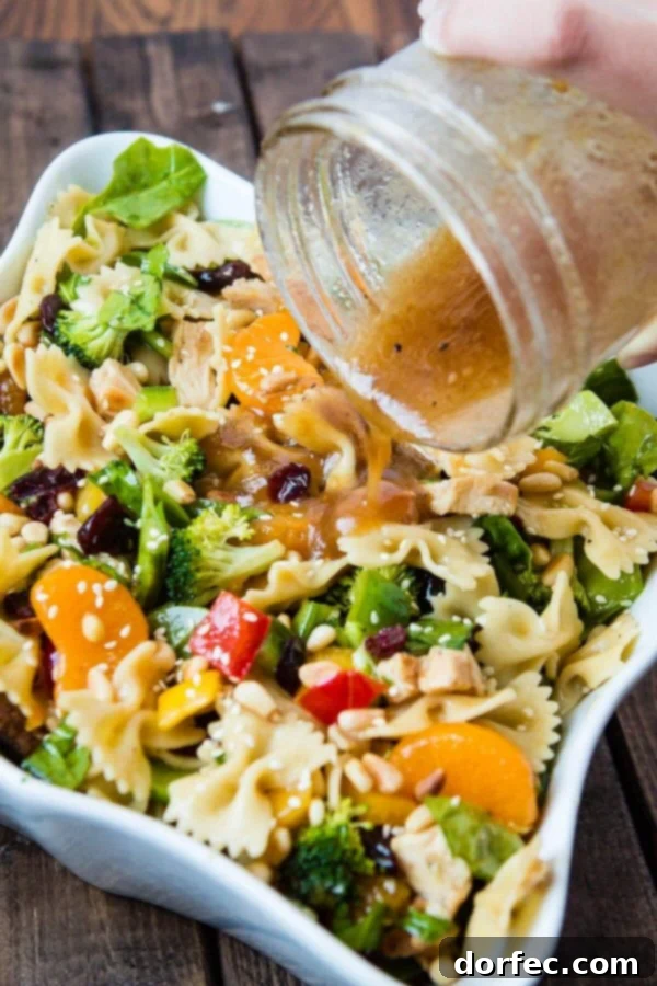 Teriyaki Chicken loaded with veggies, mandarin oranges, pasta and of course a sesame dressing makes up the yummiest teriyaki chicken pasta salad ever! ohsweetbasil.com