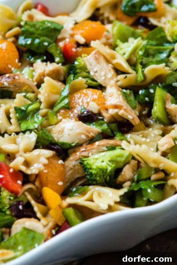 Teriyaki Chicken loaded with veggies, mandarin oranges, pasta and of course a sesame dressing makes up the yummiest teriyaki chicken pasta salad ever!