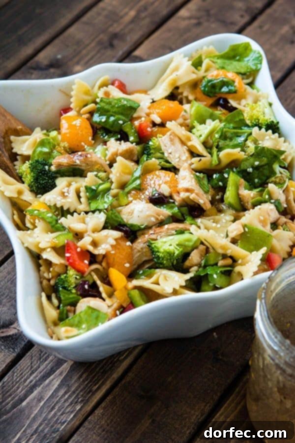 Teriyaki Chicken loaded with veggies, mandarin oranges, pasta and of course a sesame dressing makes up the yummiest teriyaki chicken pasta salad ever!