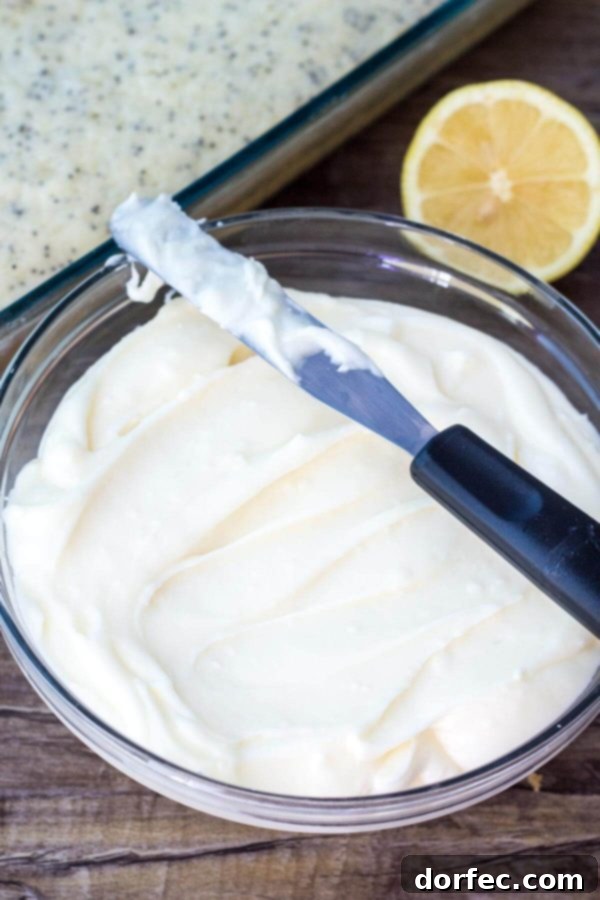This Lemon Poppy Seed Cake with Cream Cheese Frosting is soft, moist & deliciously buttery with a fresh lemon flavor. Dotted with poppy seeds & topped with cream cheese frosting - it's the perfect dessert for lemon lovers! This Lemon Poppy Seed Cake with Cream Cheese Frosting is soft, moist & deliciously buttery with a fresh lemon flavor. Dotted with poppy seeds & topped with cream cheese frosting - it's the perfect dessert for lemon lovers!