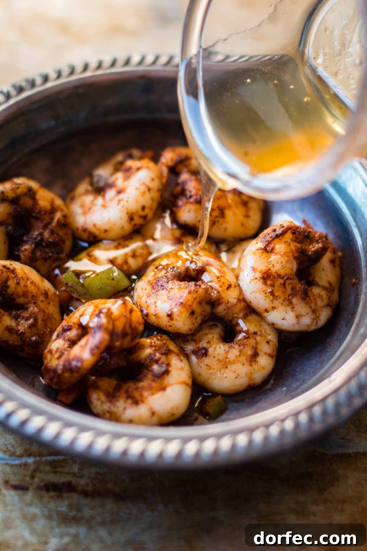 Grilled Sticky Honey Lime Lime Shrimp glistening with glaze, ready to be served
