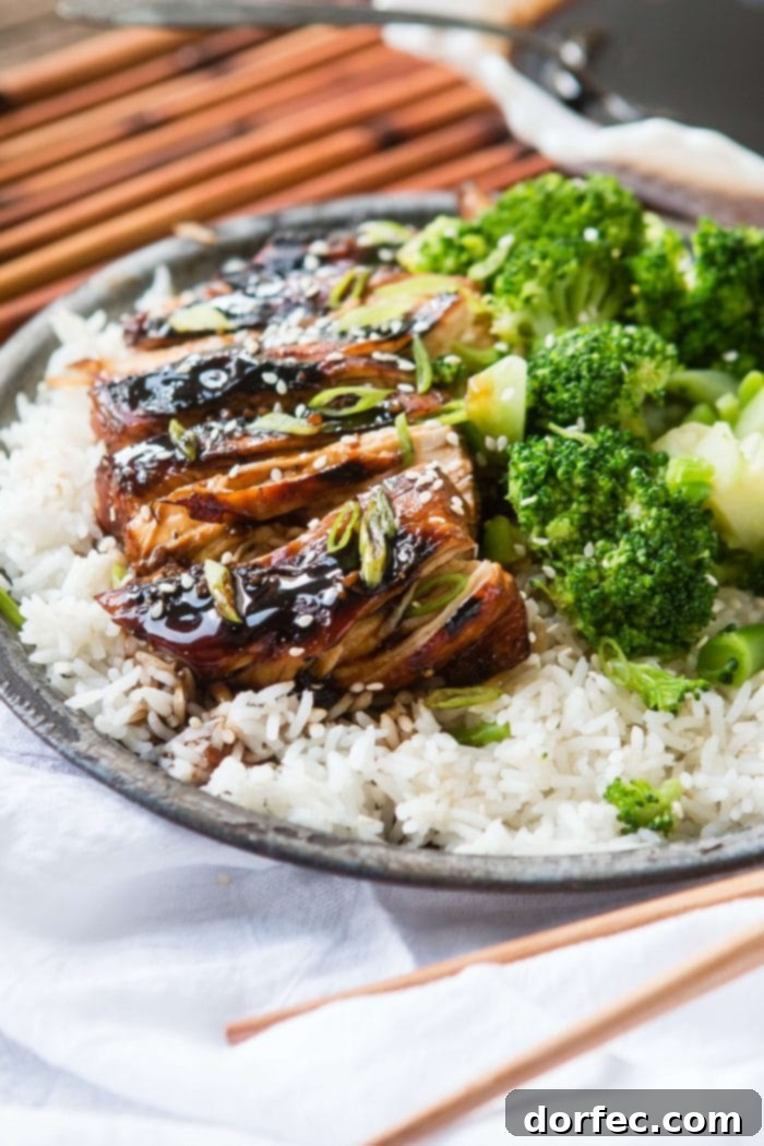 Sticky Asian Grilled Chicken Breasts - A flavorful and easy weeknight meal Close-up of Sticky Asian Grilled Chicken Breasts with vibrant sauce