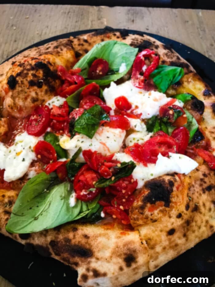 Capri Pizza from Mercato Centrale in Florence Italy, a culinary delight not to be missed. Savor the authentic flavors of Italy.