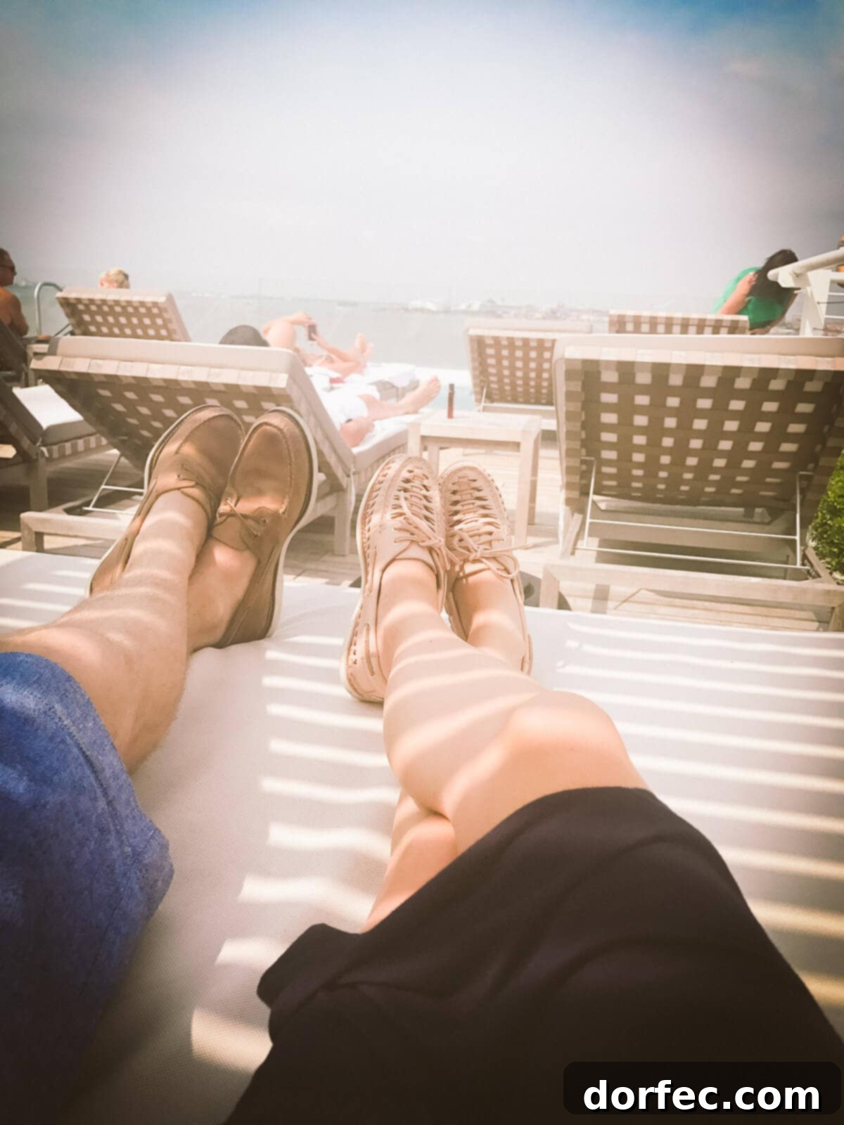 Relaxing by the JW Marriott Rooftop pool with Sperry boat shoes – the most comfortable shoes ever for travel.