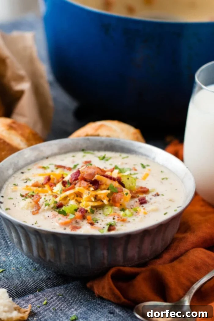 Delicious One Pot Cauliflower Chowder, a healthy and creamy fall soup alternative to traditional potato soup, perfect for cozy evenings.