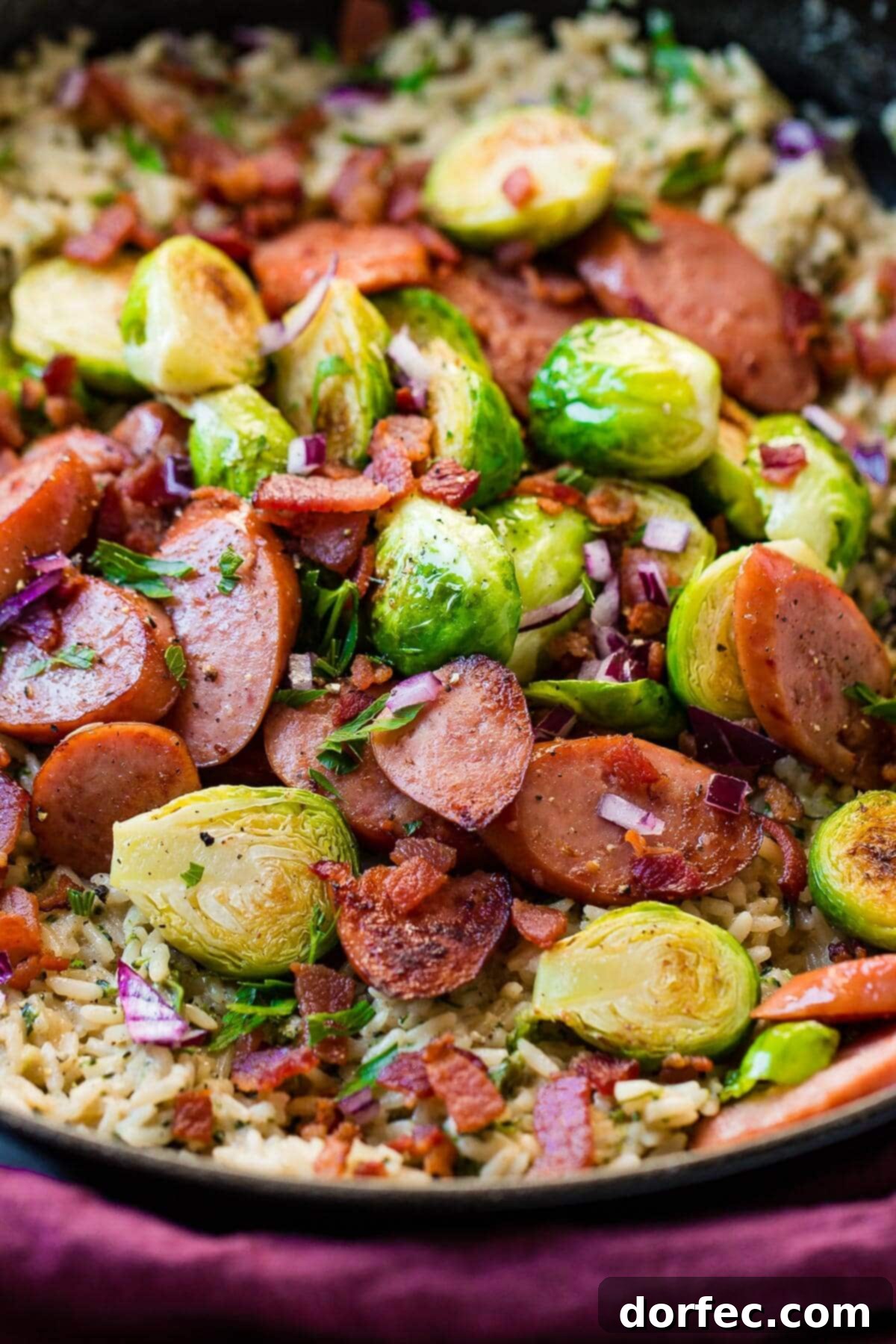A delicious and easy one-skillet cheddar broccoli rice with kielbasa recipe, perfect for a quick family dinner.