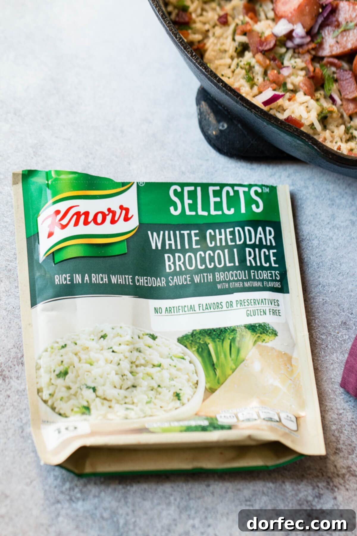 Knorr Selects White Cheddar Broccoli Rice is the perfect foundation for our quick and flavorful kielbasa one-skillet dinner.