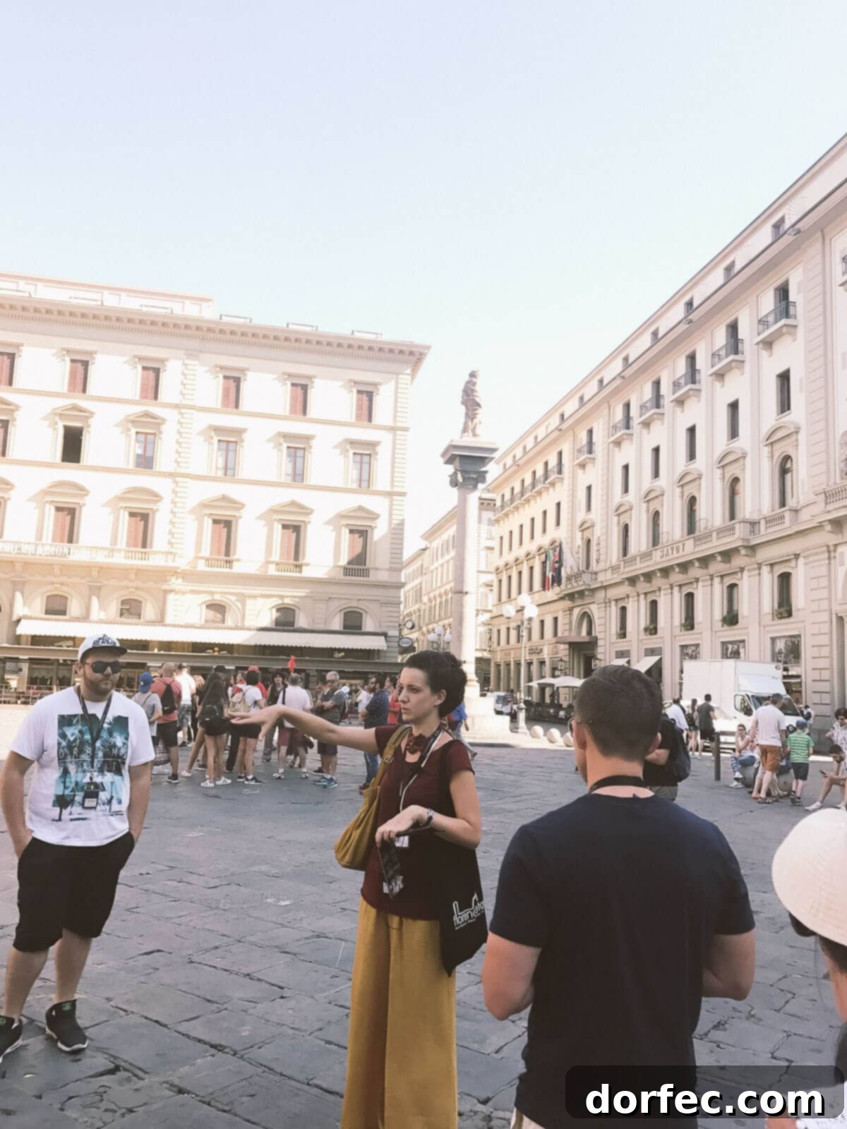 Your Perfect Florence Itinerary 8 A guided walking tour group exploring the historic streets of Florence, Italy