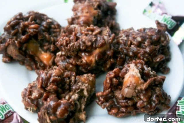 Delicious Milky Way Krispies treats arranged on a baking sheet, ready to be devoured.