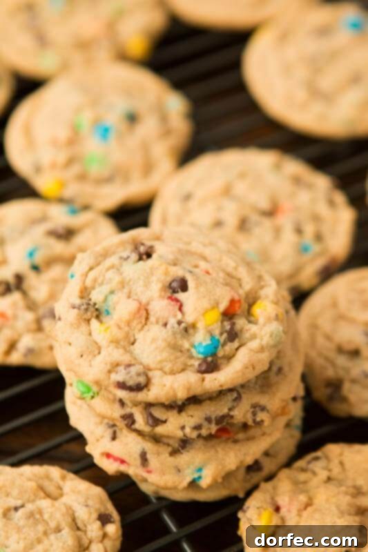Our most requested recipe to bring to get togethers: Peanut Butter Chocolate Chip M&M Cookies, a guaranteed hit.