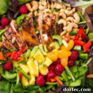 The ultimate easy teriyaki chicken salad, bursting with flavor from juicy chicken, crisp vegetables, fresh fruit, and crunchy cashews, all perfectly dressed.
