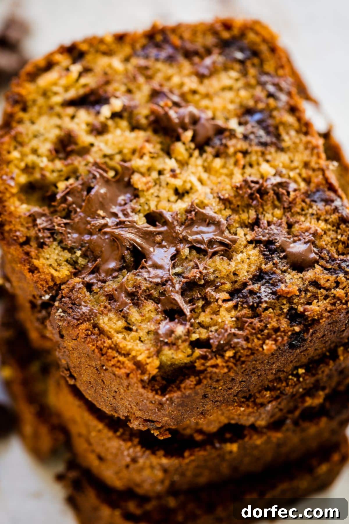 A delicious loaf of Biscoff Banana Bread, showcasing its moist texture and golden-brown crust. The subtle caramel notes of Biscoff make this a truly unique treat.