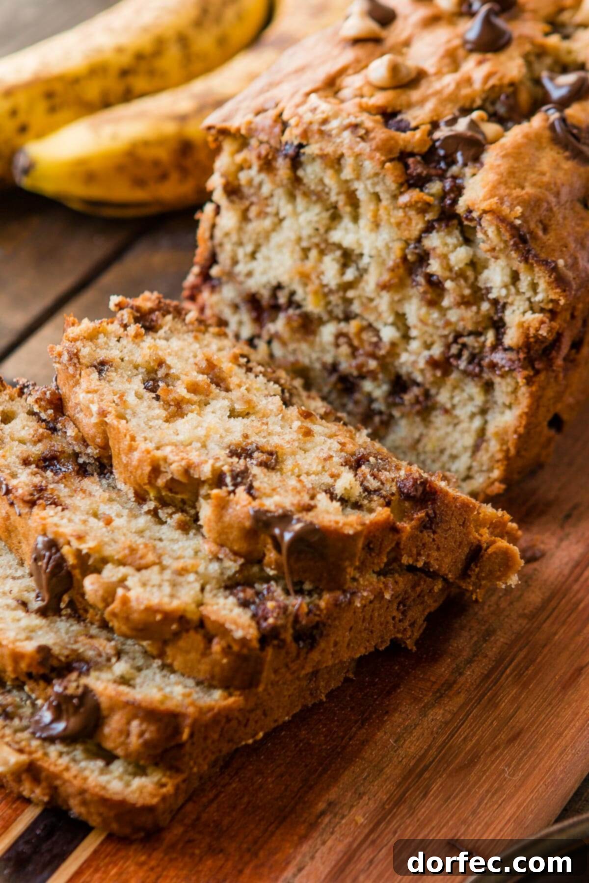 Peanut butter banana bread - a delightful combination of sweet bananas and rich peanut butter, perfect for any time of day. Find this amazing recipe at ohsweetbasil.com