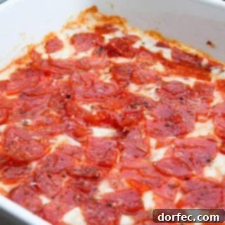 Ultimate Pepperoni Pizza Dip 4 Pepperoni Pizza Dip in a baking dish