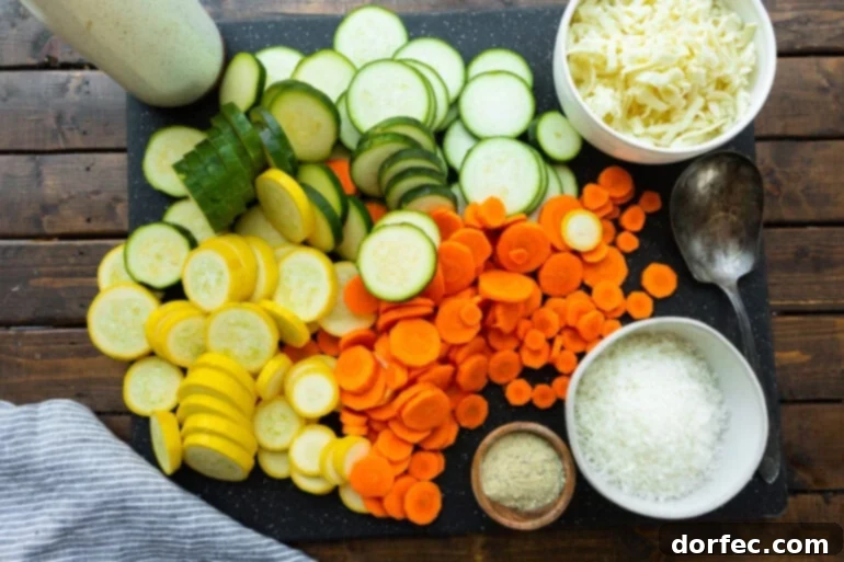 a photo of all the ingredients need for cheesy basil roasted summer vegetables