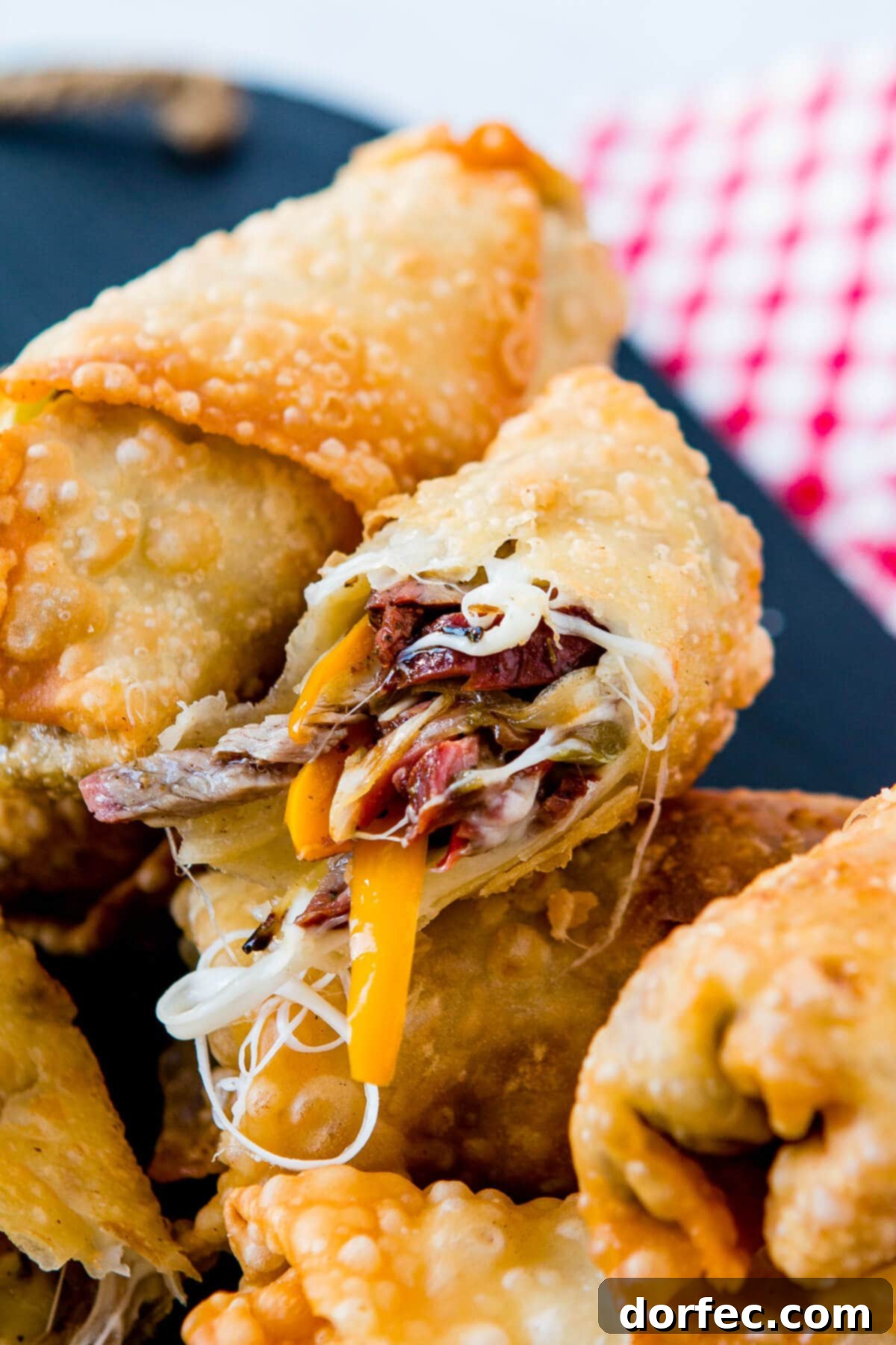 Cheesy, crunchy egg rolls that taste like a philly cheesesteak? Heck. Yes! Philly Cheesesteak Egg Rolls