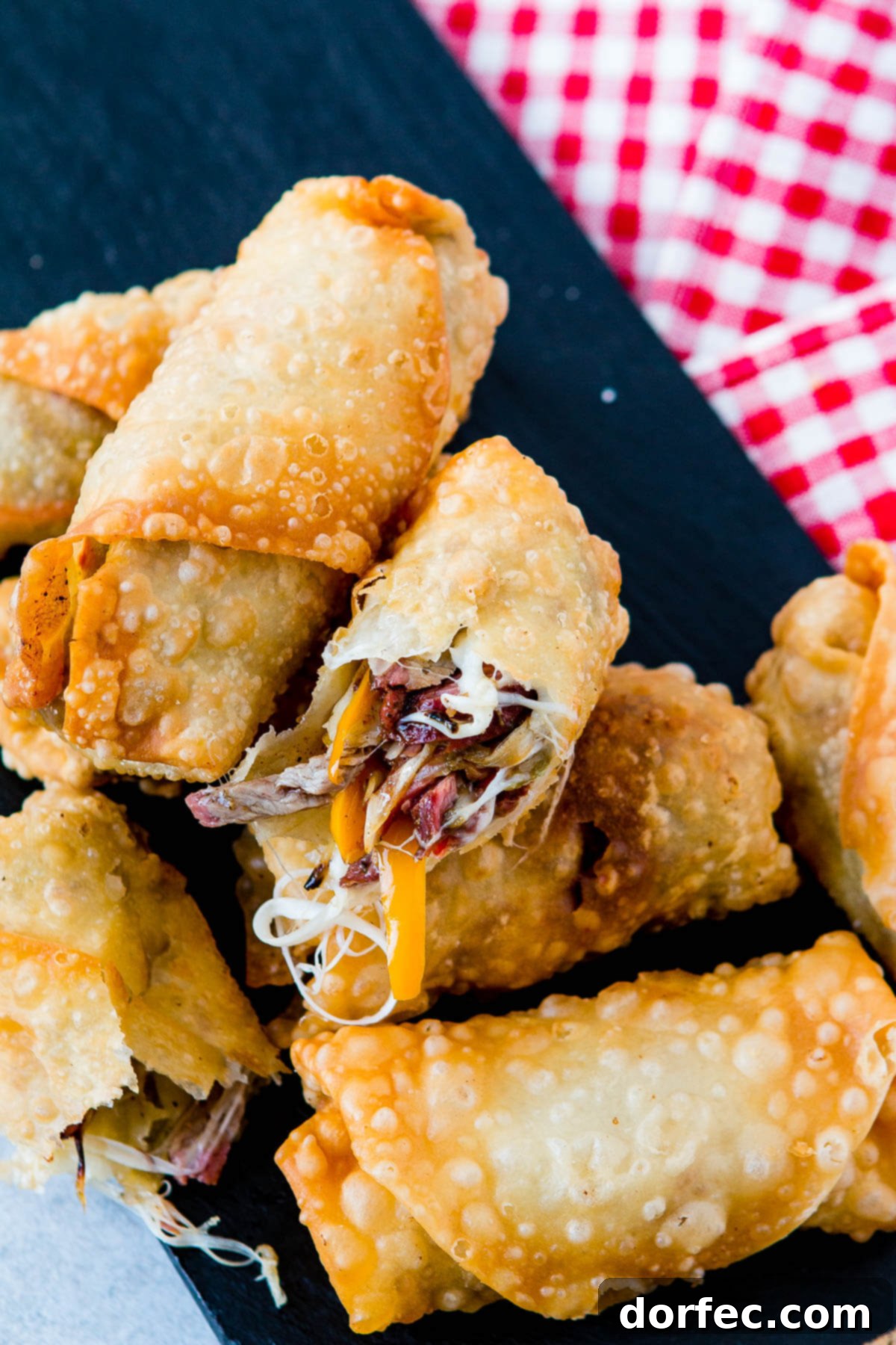 Cheesy, crunchy egg rolls that taste like a philly cheesesteak? Heck. Yes! Philly Cheesesteak Egg Rolls