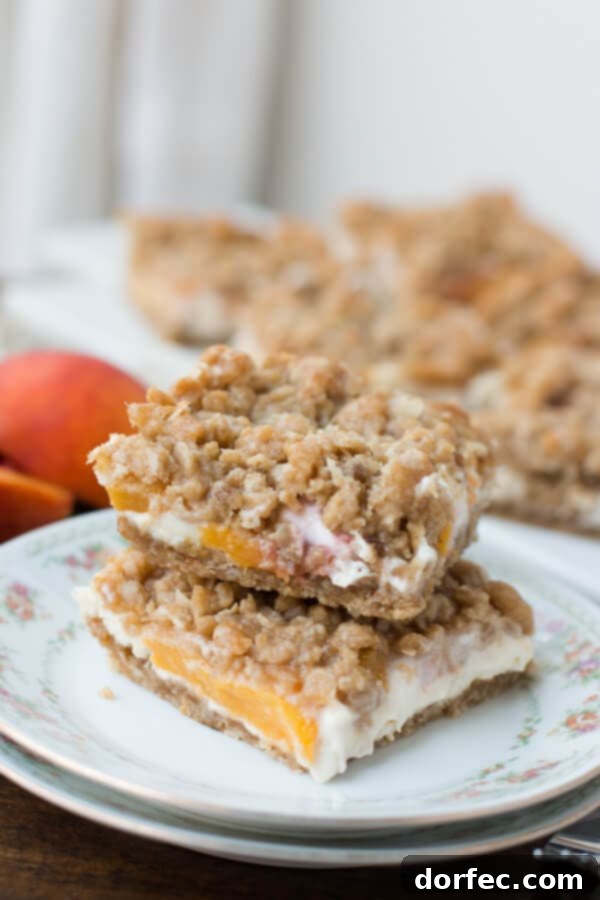Key Lime Pie Bars 9 Best Recipe for peaches and cream crumble bars!! ohsweetbasil.com