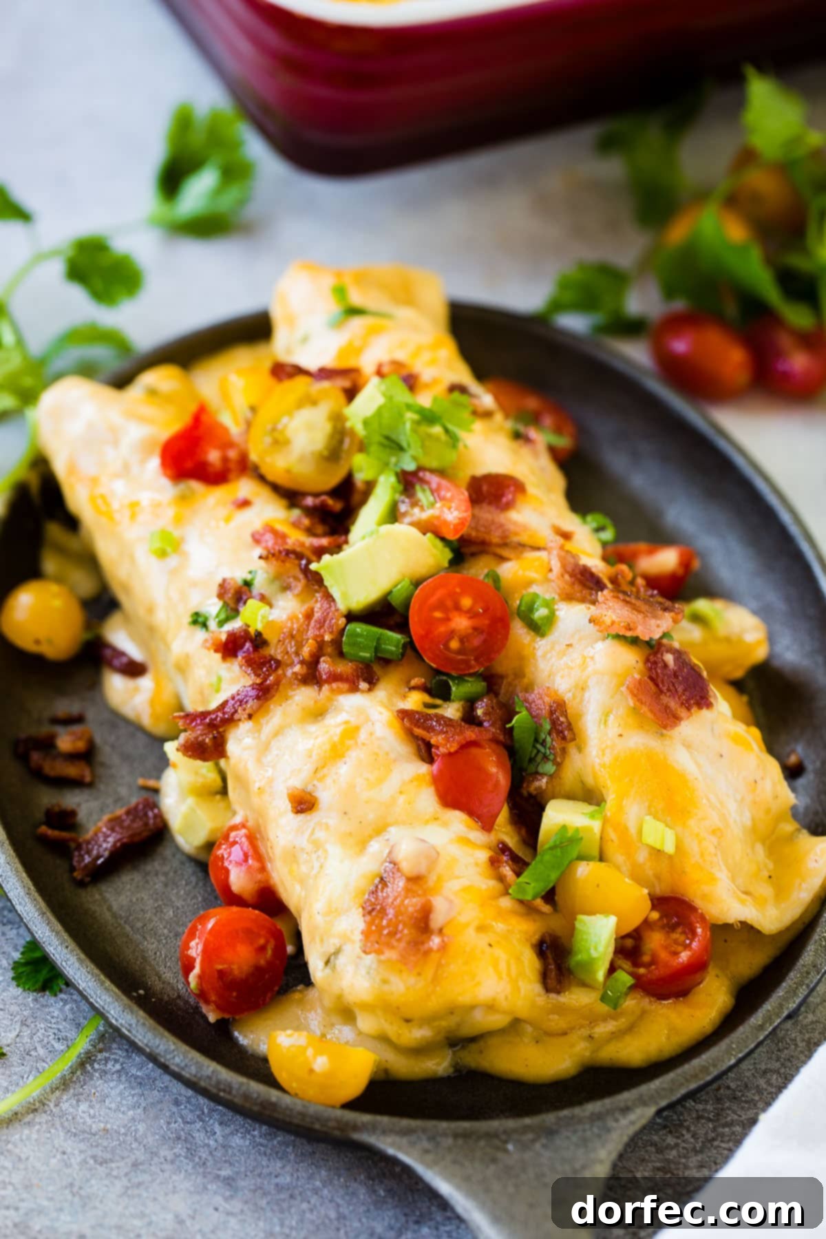 The holidays are here and you need breakfast enchiladas to feed a crowd. You do. Make these Cheesy Salsa Verde Sausage Breakfast Enchiladas!