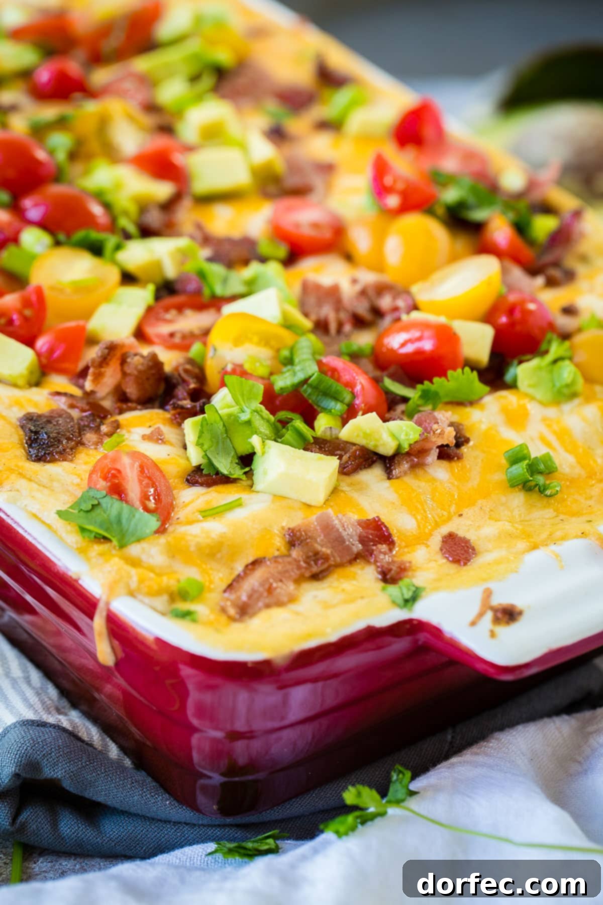 Mexican style breakfast casserole is just what you need for the holidays. Cheesy salsa verde sausage breakfast casserole ohsweetbasil.com 
