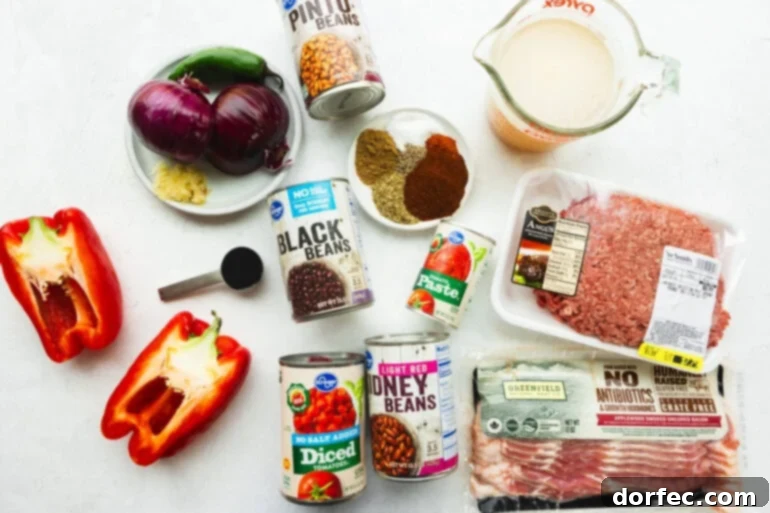 Championship Instant Pot Chili 5 all the ingredients for the best instant pot chili with ground beef, bacon, black beans, pinto beans, fire roasted tomatoes, onions, red bell pepper, and spices