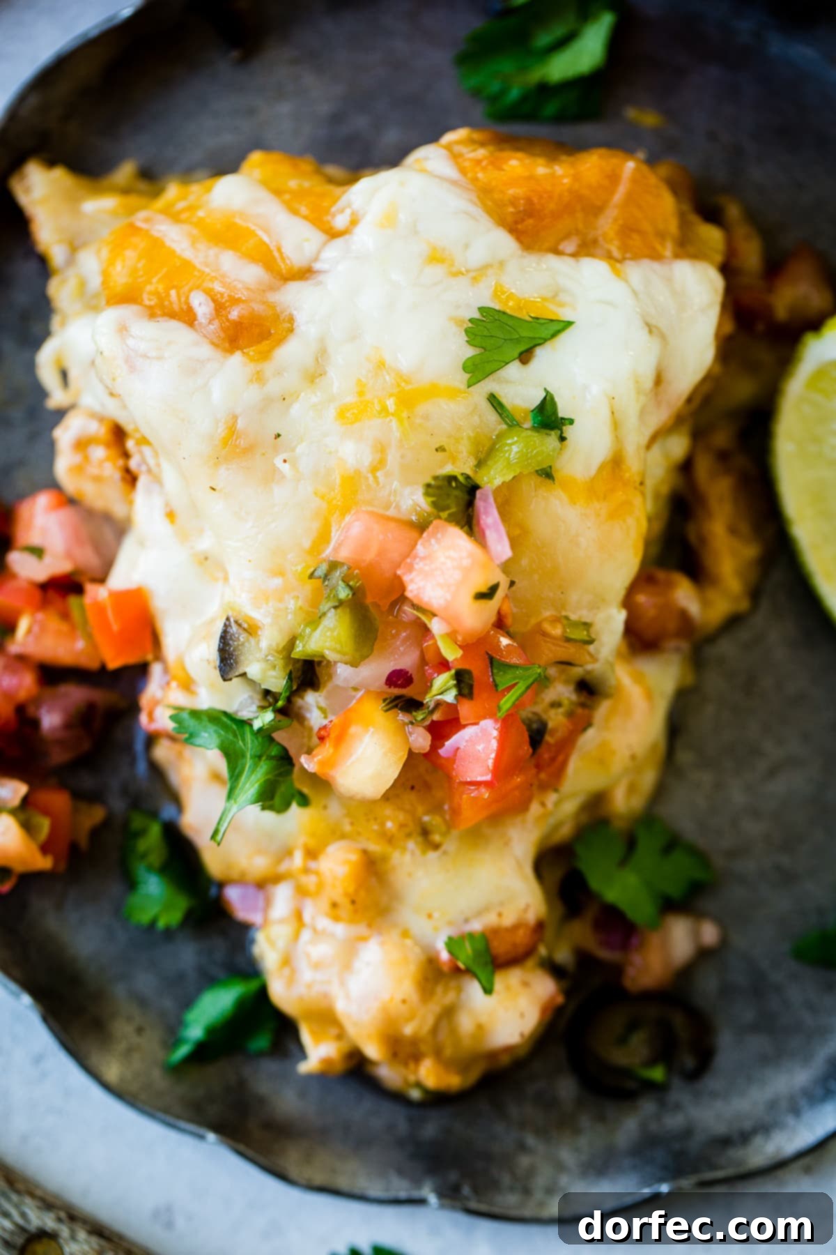 One Pan Honey Lime Chicken Enchilada Bake 4 One Skillet Honey Lime Chicken Enchiladas Casserole with pinto beans and lots of melted cheese, a quick and easy Mexican recipe.