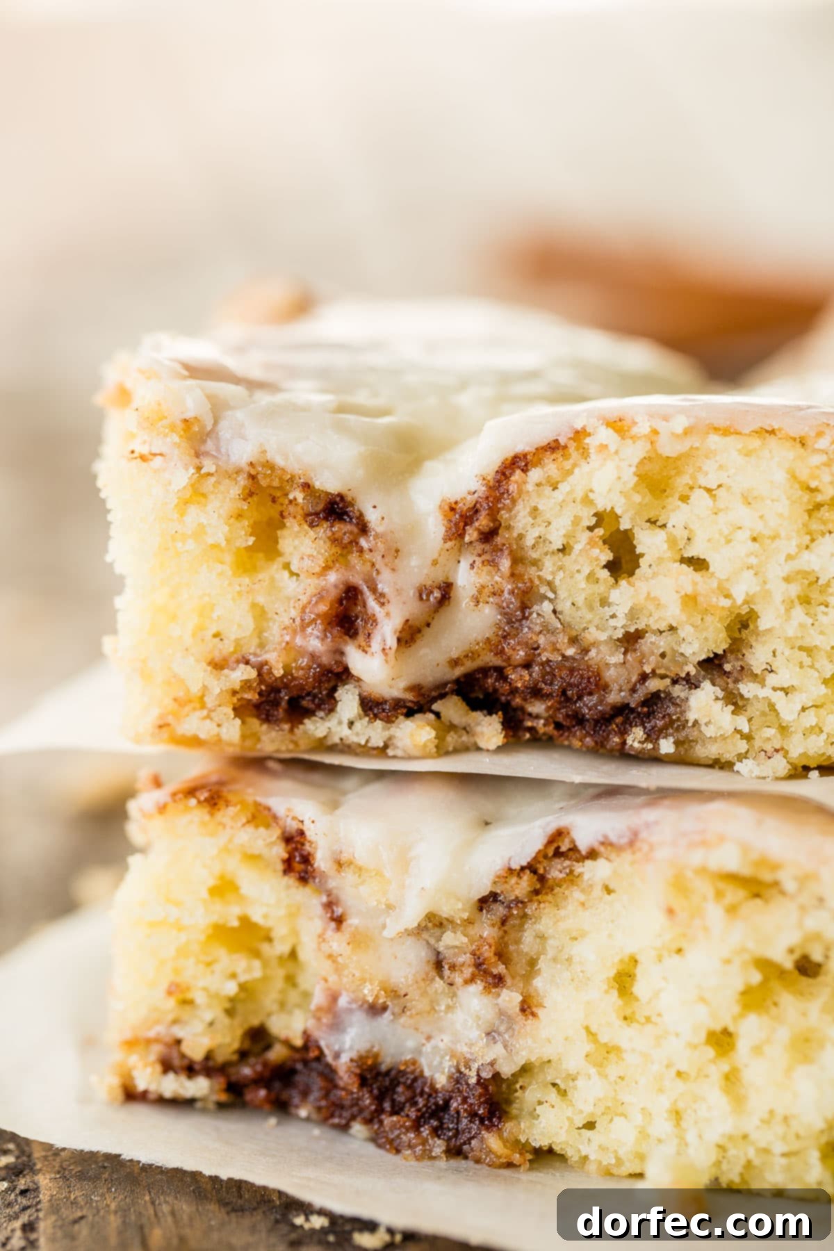 Close-up of the delicious cinnamon swirl within the Cinnabon Cinnamon Roll Sheet Cake, showcasing its moist texture.