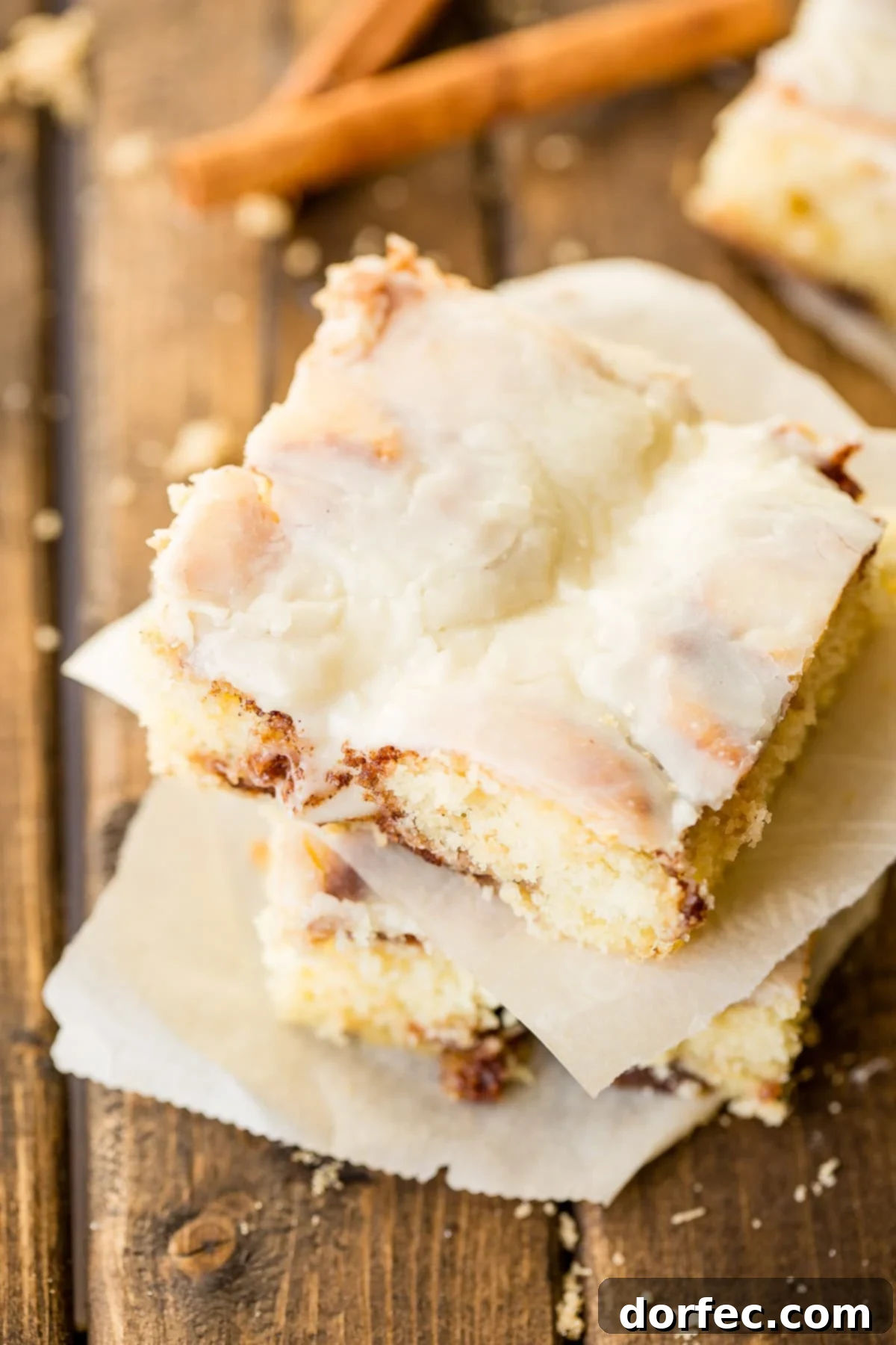 Top view of the Cinnabon Cinnamon Roll Sheet Cake, showcasing the inviting swirls and ample cream cheese frosting.