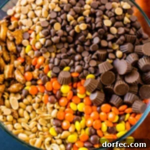 A top-down view of the Reese's Snack Mix, featuring a mix of colorful candies and crunchy elements.