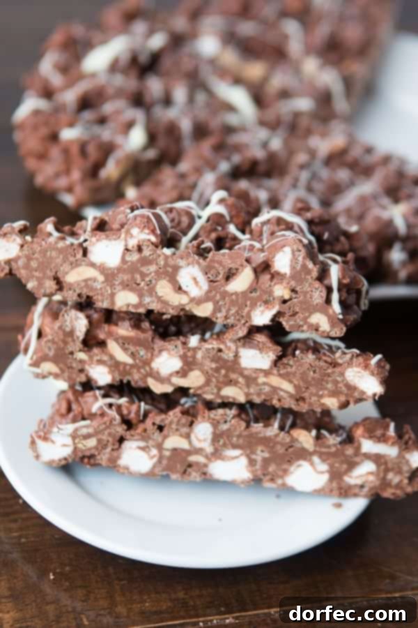 Crunchy, chocolatey, treats! Rocky Road Chocolate Pizza ohsweetbasil.com