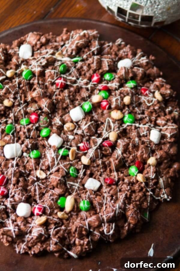 There's such an amazing air about the holidays, but it's also way too busy. This year choose to cut out the crazy and make this quick and easy m&m chocolate pizza. ohsweetbasil.com