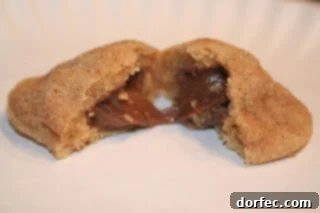 Decadent Chocolate Hazelnut Surprise Cookies with a gooey Nutella center.