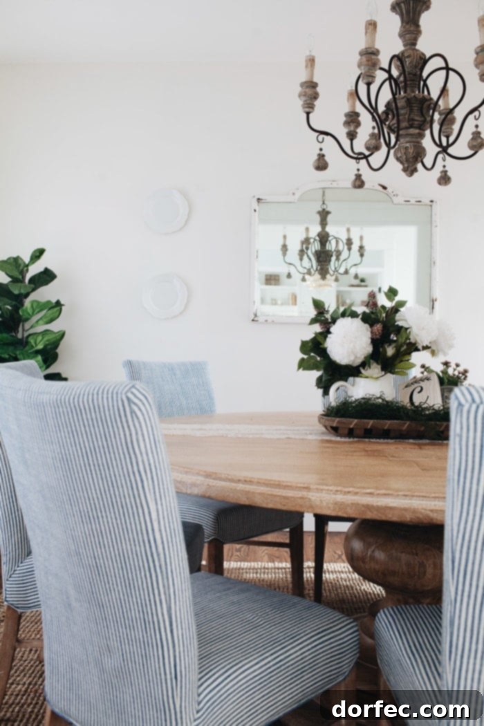 Another perspective of the charming French Country Dining Room, highlighting the harmonious blend of natural textures and a welcoming atmosphere.