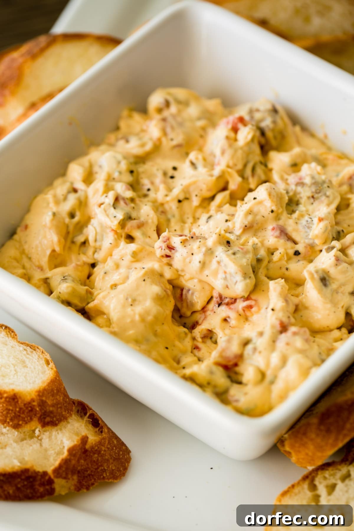 Ultimate Cheesy Slow Cooker Sausage Dip 5 Throw tomatoes, ranch dip, cheese, cream cheese and sausage in a slow cooker and you've got cheesy slow cooker sausage dip! ohsweetbasil.com