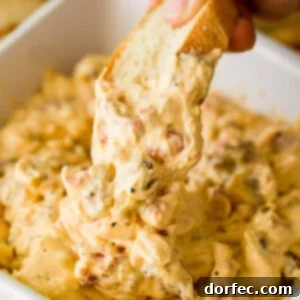 Ultimate Cheesy Slow Cooker Sausage Dip 8 A small list of ingredients, one slow cooker and you've got yourself a cheesy slow cooker sausage dip! We use Marzetti Ranch dip to add more flavor! ohsweetbasil.com