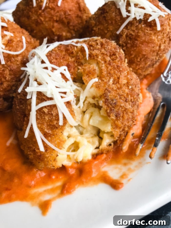 Deep Fried Macaroni and Cheese from The Cheesecake Factory, a rich and crispy appetizer, filled with gooey cheese.
