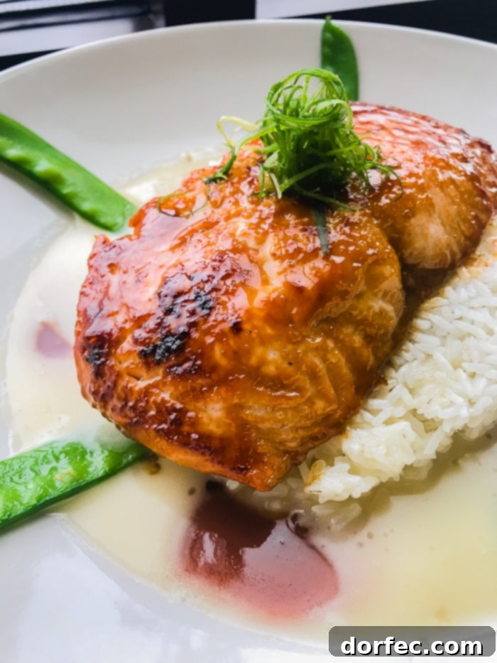 Miso Salmon served with perfectly cooked rice and a savory glaze at The Cheesecake Factory.