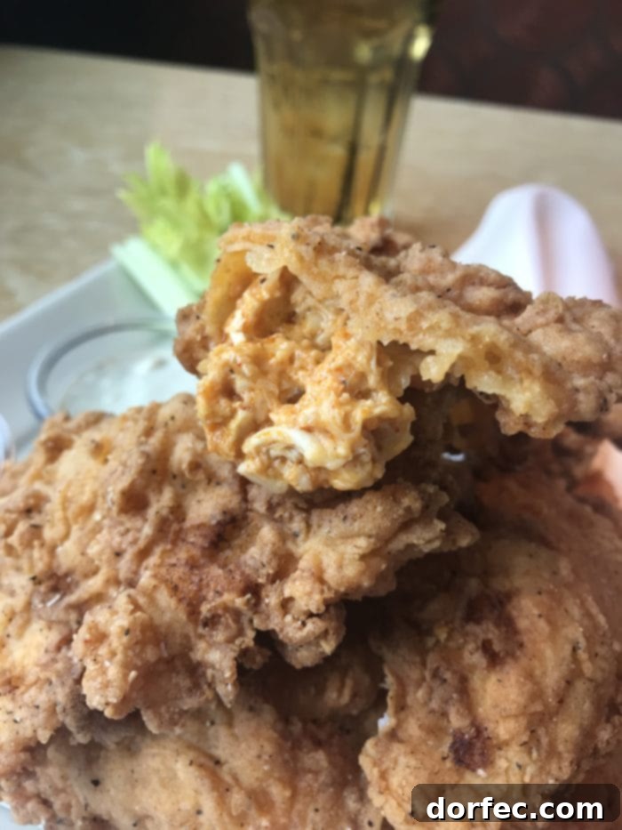 Delicious Buffalo Blasters, a new favorite appetizer at The Cheesecake Factory, featuring crispy exteriors and flavorful chicken.