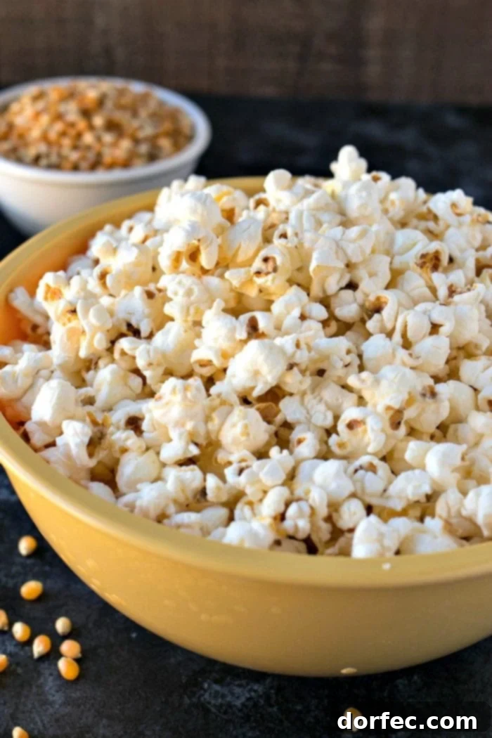 A close up of a big yellow bowl of Salt & Vinegar Popcorn.