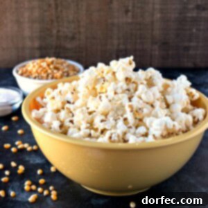 Salt & Vinegar Popcorn - Fresh, homemade popcorn is tossed in sea salt and powdered vinegar to make for a healthy alternative to your favorite potato chip.