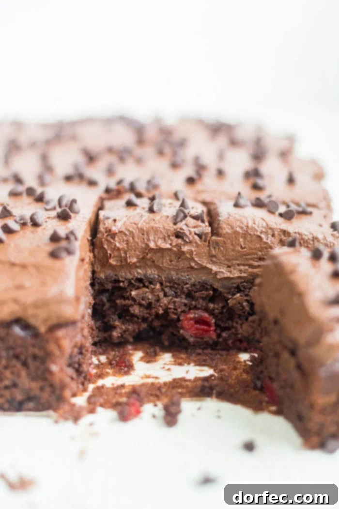Decadent Chocolate Cherry Cake 4 easy chocolate cake with cherry pie filling, sliced in baking dish