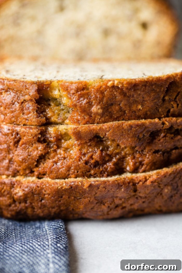 Irresistible Sour Cream Banana Bread 5 Slices of sour cream banana bread layered on top of each other