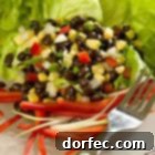 Close-up of freshly prepared Corn and Black Bean Salad with Roasted Red Pepper, highlighting its vibrant colors.
